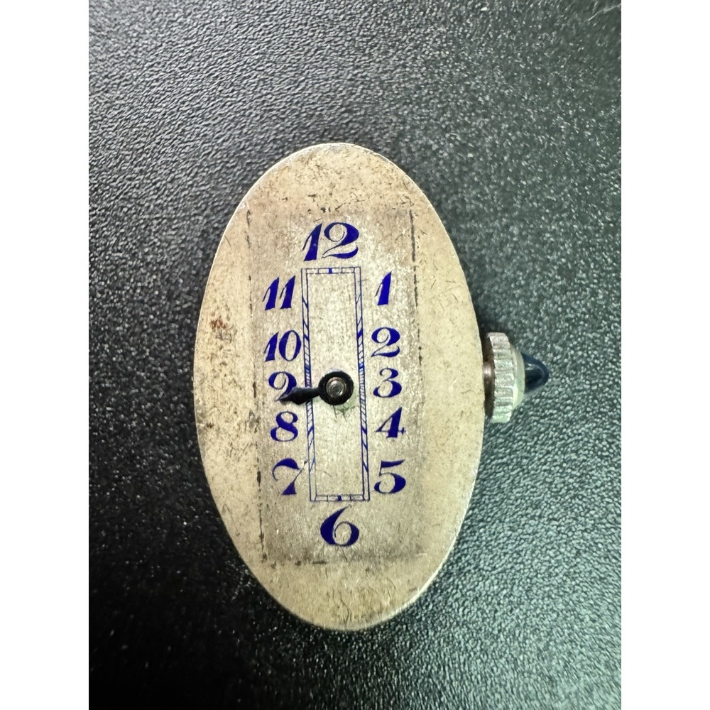 Vintage Hoffman Watch Co. movement dial with a‎ single hand